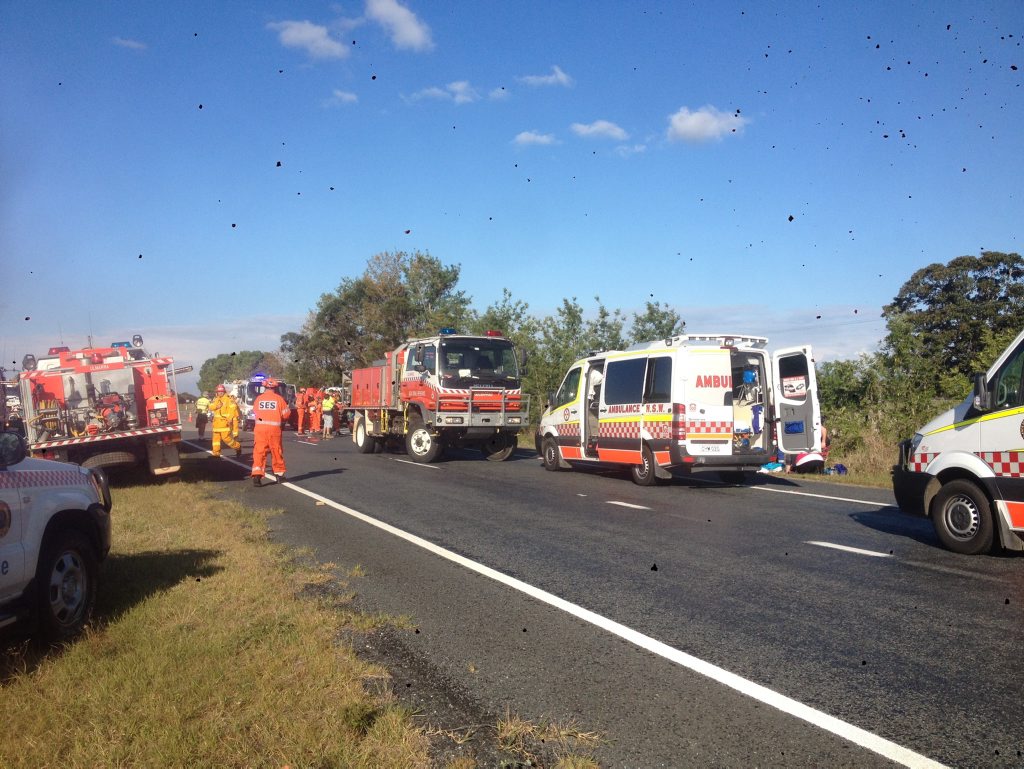 SERIOUS CRASH: Emergency services at the scene of this afternoon's Pacific Highway crash. Up to eight people are believed to be injured, one seriously. PHOTO: Jojo Newby SERIOUS CRASH: Emergency services at the scene of this afternoon's Pacific Highway crash. Up to eight people are believed to be injured, one seriously. PHOTO: Jojo Newby